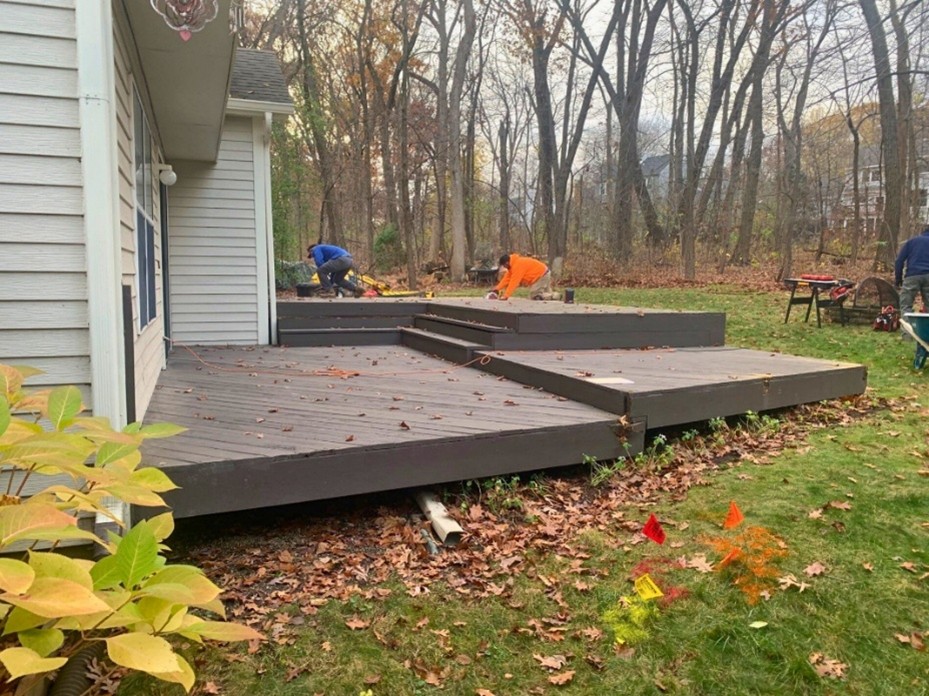 Archadeck crew building a deck in the fall in Palatine